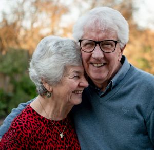 Senior couple discussing Medicare coverage options with a professional in El Dorado Hills, CA